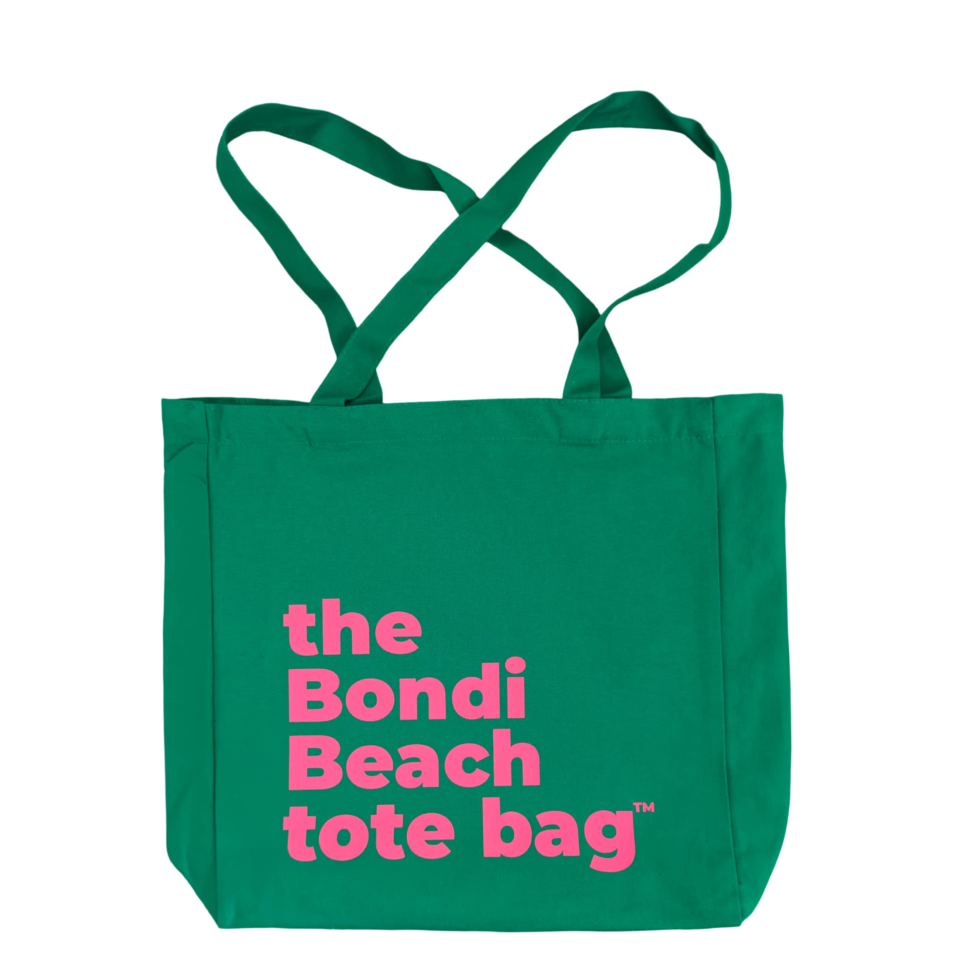 Green tote bag with pink text 'the Bondi Beach tote bag' on a white background